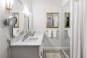 Bathtub, hair dryer, towels, soap