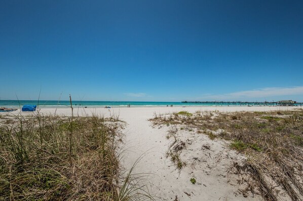 On the beach, sun-loungers