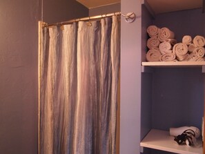 Hair dryer, towels, soap, shampoo