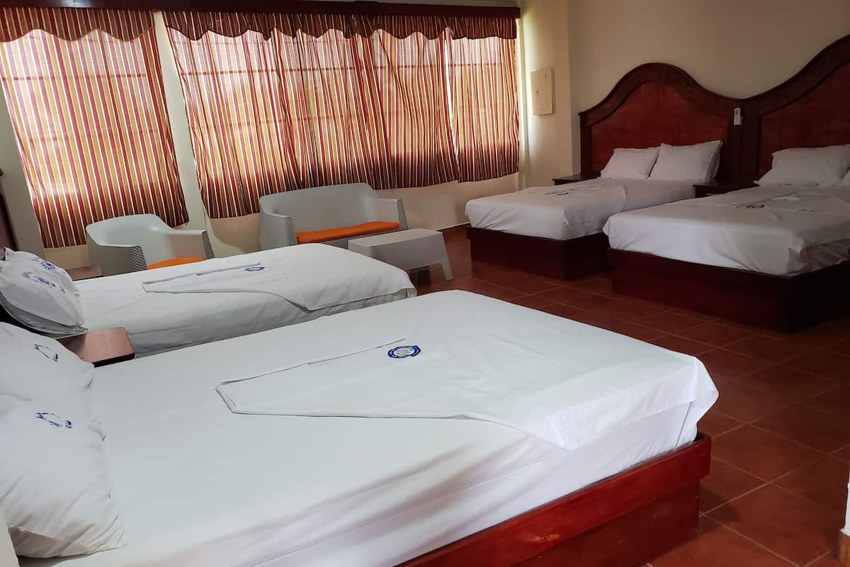 Cortinas blackout, camas plegables/adicionales y wifi gratis