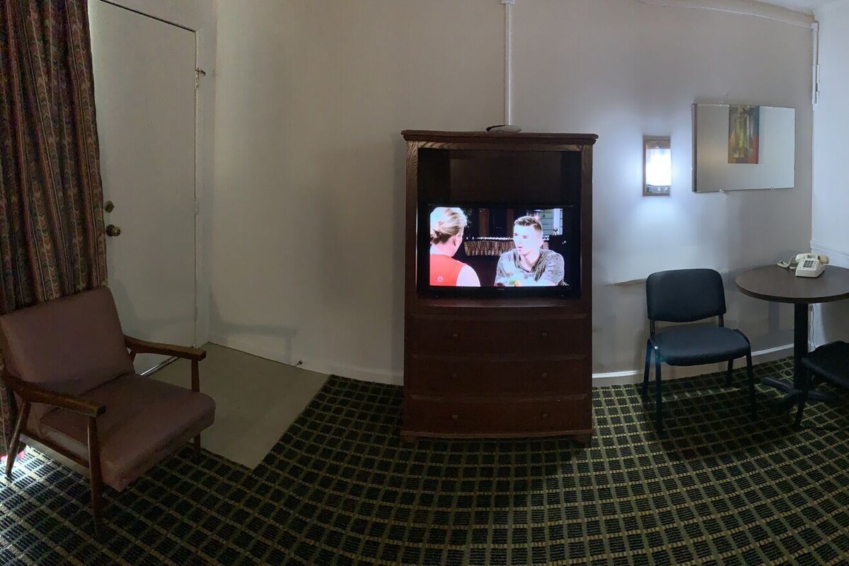 Desk, blackout drapes, WiFi (free), bed sheets