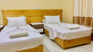 Egyptian cotton sheets, premium bedding, down duvets, memory-foam beds