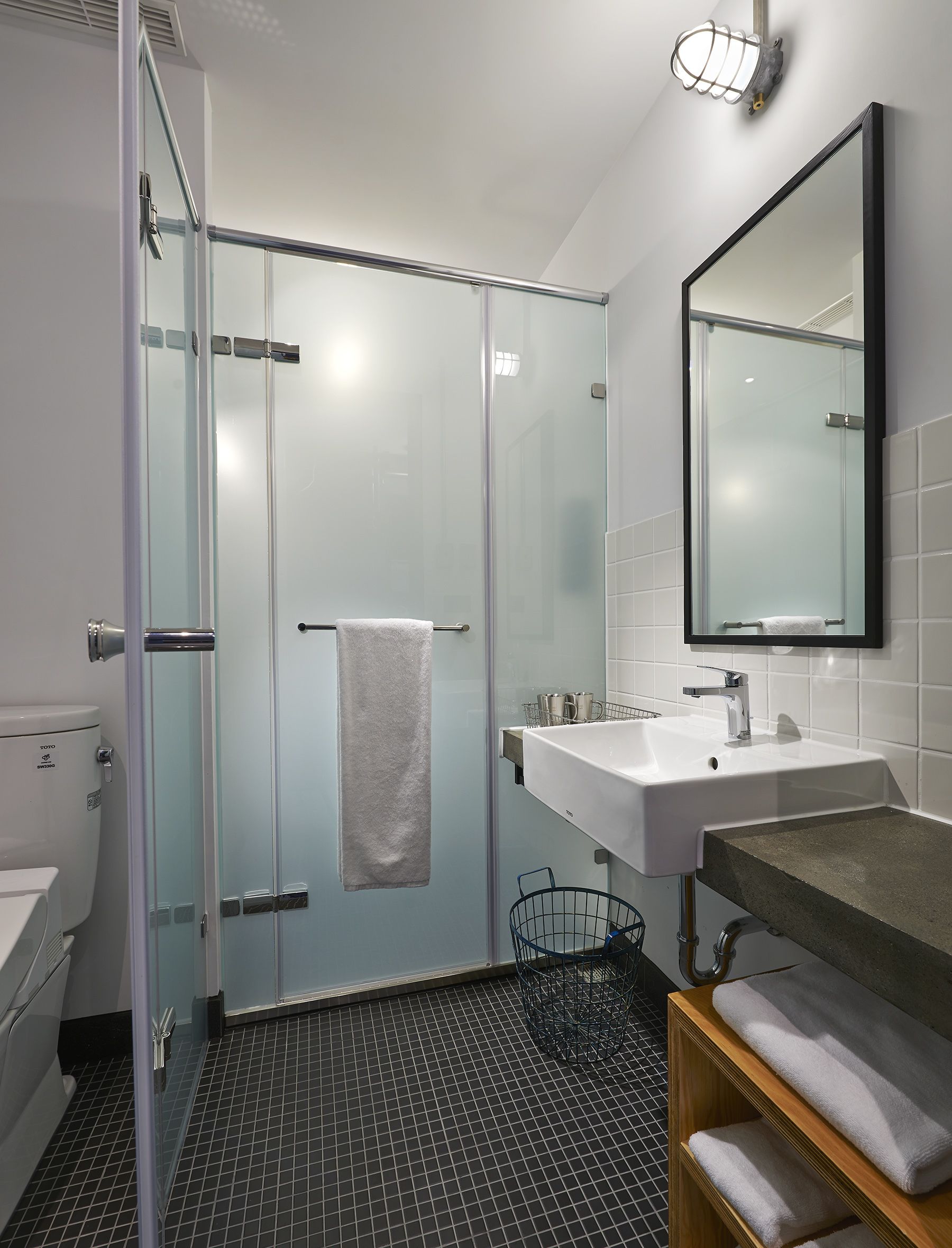 hair dryer, slippers, towels, shampoo