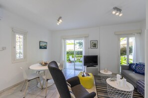 Villa | Living area | Flat-screen TV