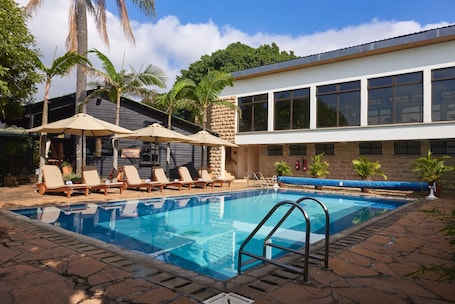 Outdoor pool, open 6:00 AM to 6:00 PM, pool umbrellas, pool loungers. Aero Club of East Africa