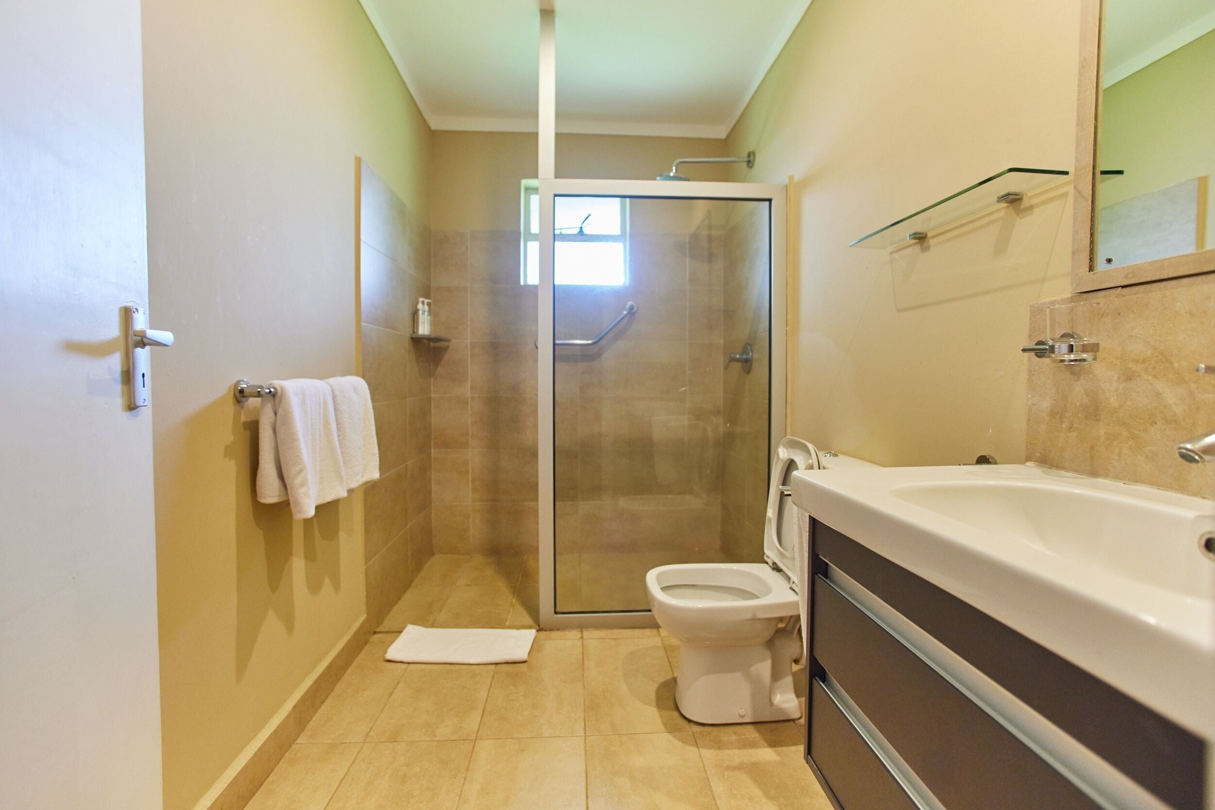 standard room (crew wing) | bathroom | shower, free toiletries, hair dryer, slippers