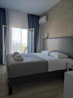 Comfort Double Room | Minibar, iron/ironing board (on request), WiFi (free), bed sheets