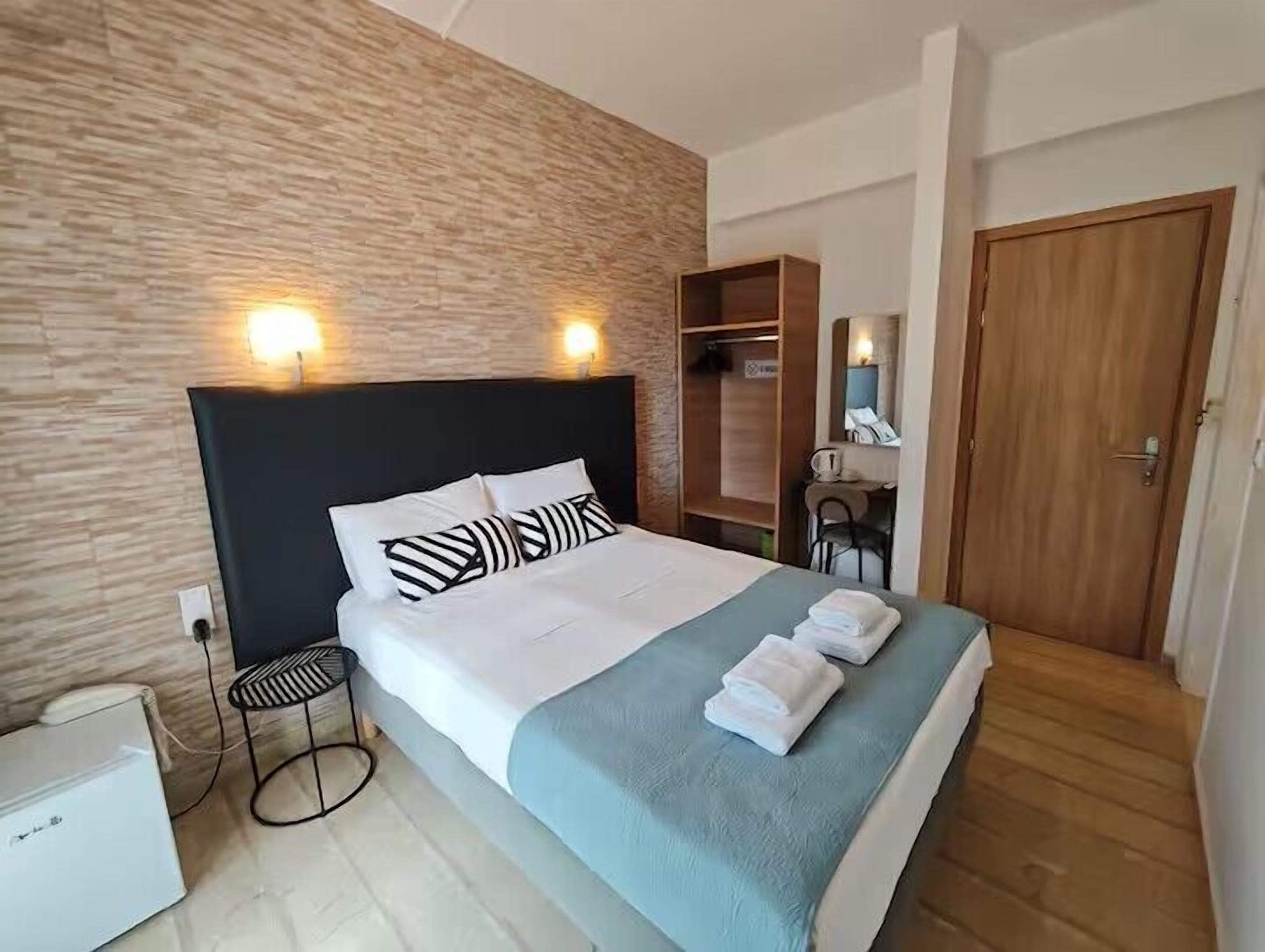 Economy Double Room, Garden View | Minibar, iron/ironing board, free WiFi, bed sheets