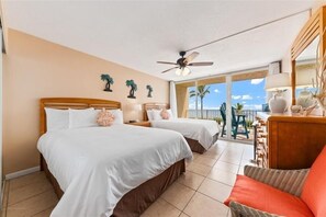 1 habitación, tabla de planchar con plancha, ropa de cama y despertador 