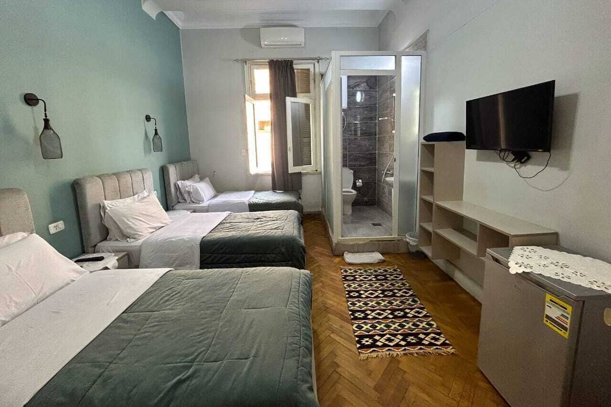 华丽三人房, 3 张单人床, 吸烟房, 城市景观 | 客房内保险箱、免费 WiFi、床单