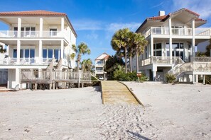 Guests can enjoy stunning ocean views from the balconies of these beachfront buildings.