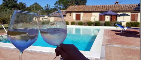 Outdoor pool, open 6:00 AM to 10:00 PM, pool umbrellas, sun loungers