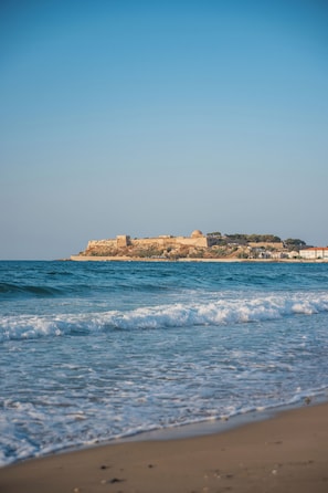 On the beach, sun-loungers, beach towels