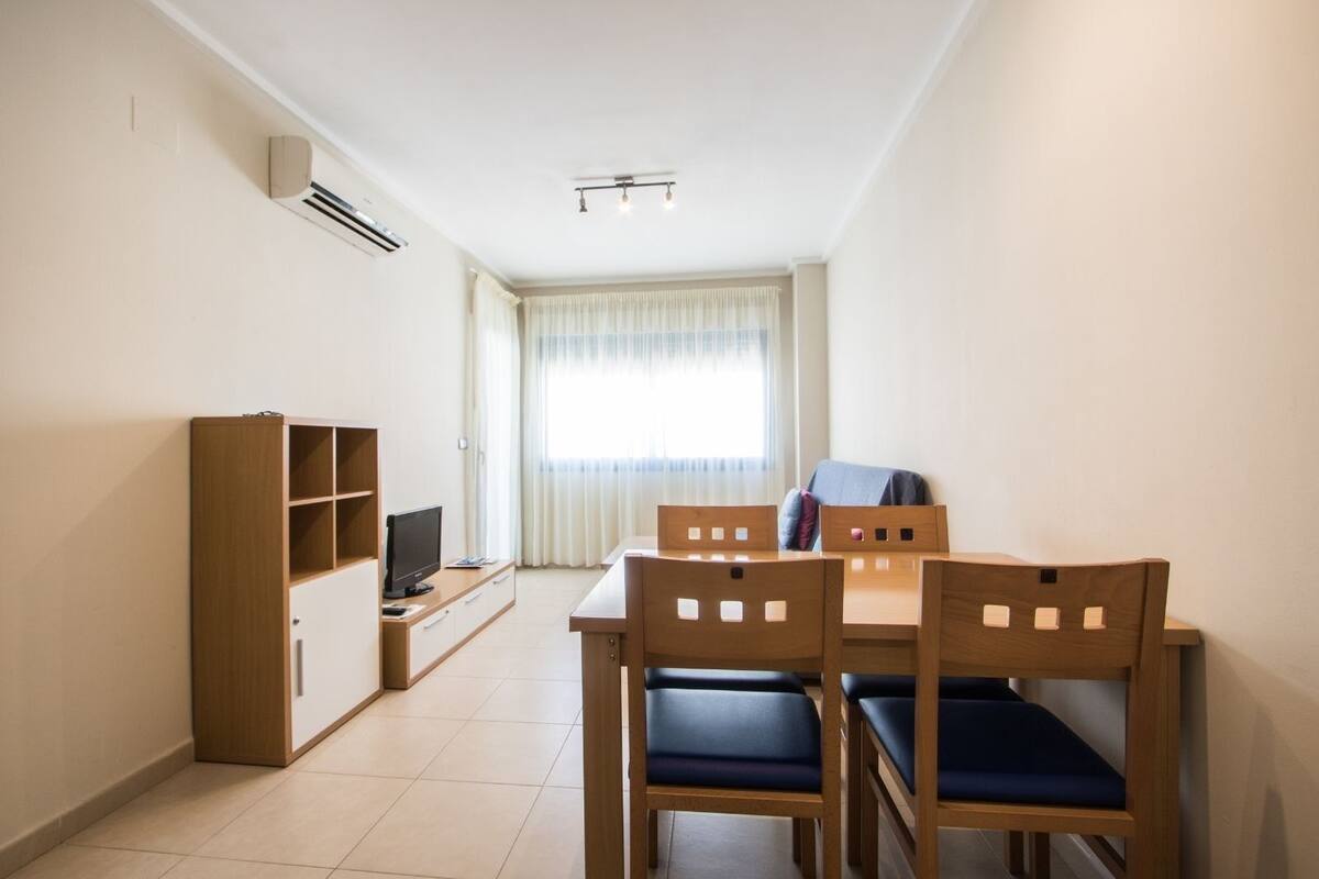 apartment, 1 bedroom, balcony | living area | flat-screen tv