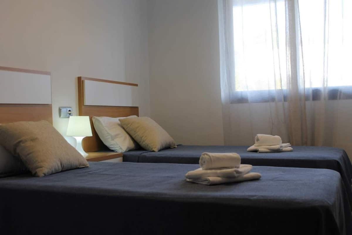 Appartamento, 2 camere da letto, balcone | Una cassaforte in camera, ferro/asse da stiro, Wi-Fi gratuito, lenzuola