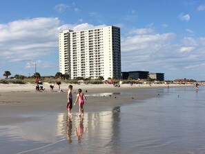 On the beach, sun-loungers