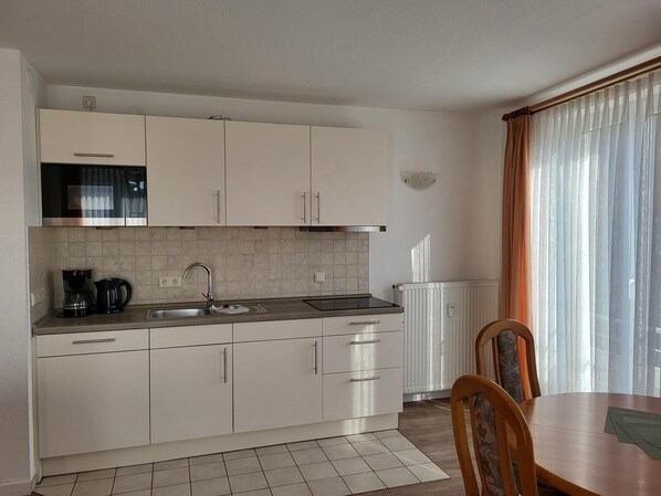 Fridge, microwave, dishwasher, coffee/tea maker