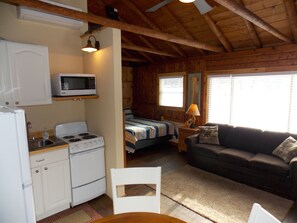 Cozy and comfortable living space in a true cabin experience.