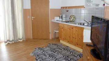 Fridge, microwave, coffee/tea maker, toaster