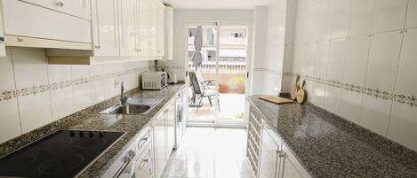 Fridge, microwave, dishwasher, coffee/tea maker