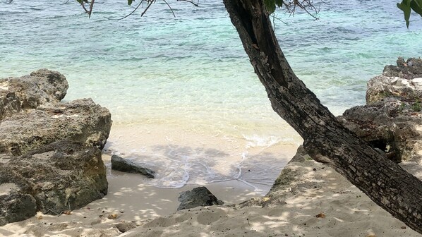 On the beach, sun loungers, beach towels