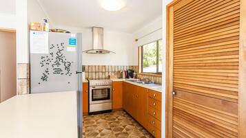 Fridge, toaster, cookware/dishes/utensils