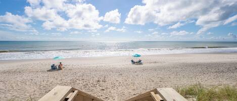 On the beach, sun loungers, beach towels