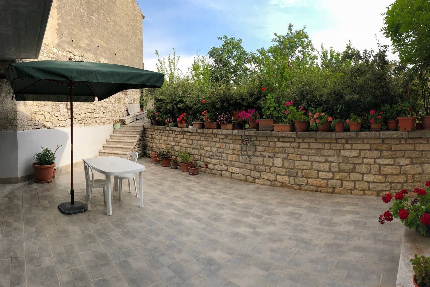 Comfortable apartment in the center of the village with a magnificent garden for relaxation