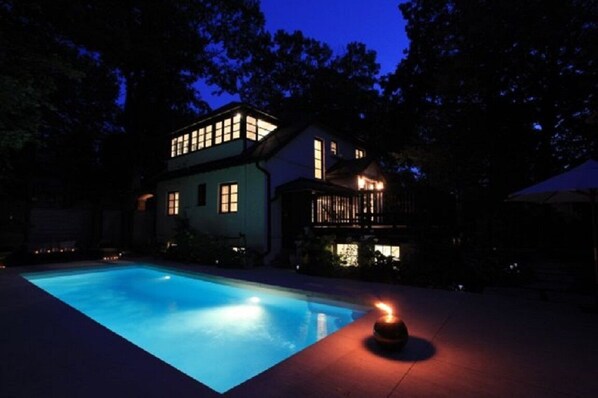 Enjoy a refreshing swim in the pool surrounded by the house's unique exterior.