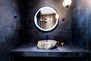 Bathtub, hair dryer, towels