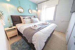 Design-Apartment, Stadtblick | 2 Schlafzimmer, Zimmersafe, individuell eingerichtet, Schreibtisch