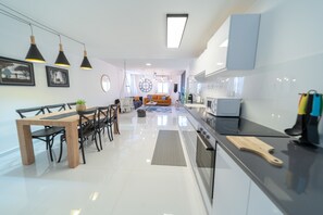 Apartment, Multiple Beds, Non Smoking, City View | Living area | Smart TV