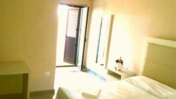 Comfort Apartment, Courtyard View | Individually decorated, individually furnished, desk, iron/ironing board