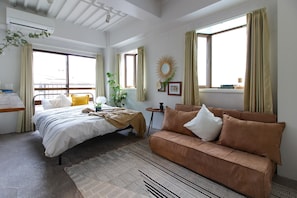 Standard Family Room, City View | Hypo-allergenic bedding, individually decorated, blackout drapes