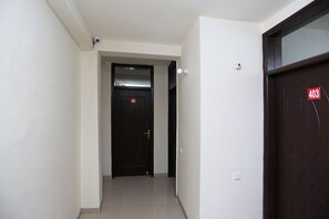 Deluxe Double Room, 1 King Bed, Non Smoking, City View | Living area | 42-inch LED TV with cable channels, TV, fireplace