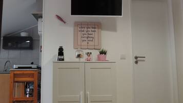 Fridge, microwave, stovetop, cookware/dishes/utensils
