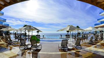 Indoor pool, outdoor pool, open 9:00 AM to 6:00 PM, pool umbrellas