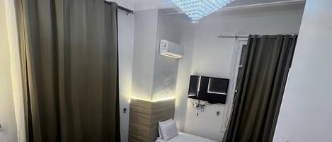 Premium bedding, down comforters, pillowtop beds, minibar