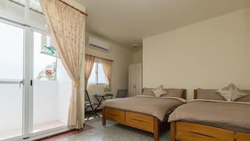 Premium Quadruple Room, 2 Queen Beds, Sea View | Blackout drapes, soundproofing, free WiFi, bed sheets