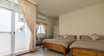 Premium Quadruple Room, 2 Queen Beds, Sea View | Blackout drapes, soundproofing, free WiFi, bed sheets