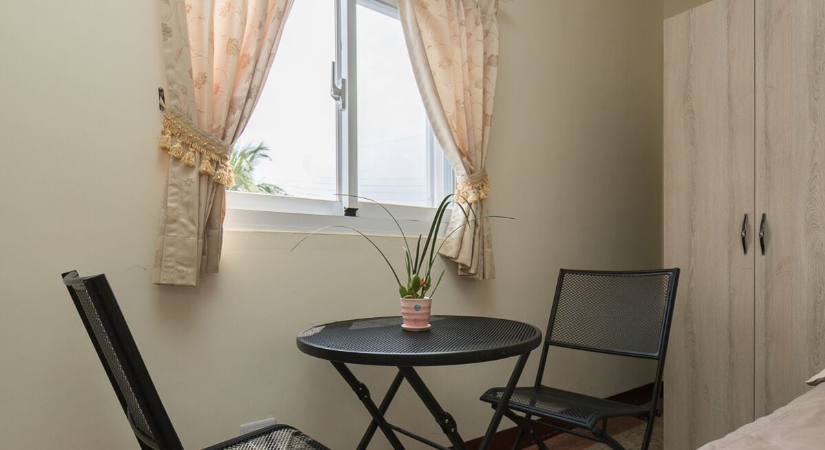 Habitación cuádruple Premium, 2 camas Queen size, vista al mar | Servicio a la habitación