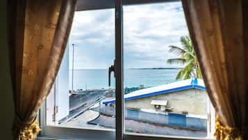 Premium Quadruple Room, 2 Queen Beds, Sea View | Terrace/patio