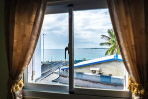 Premium Quadruple Room, 2 Queen Beds, Sea View | Terrace/patio - Blackfoot Homestay (Taitung)