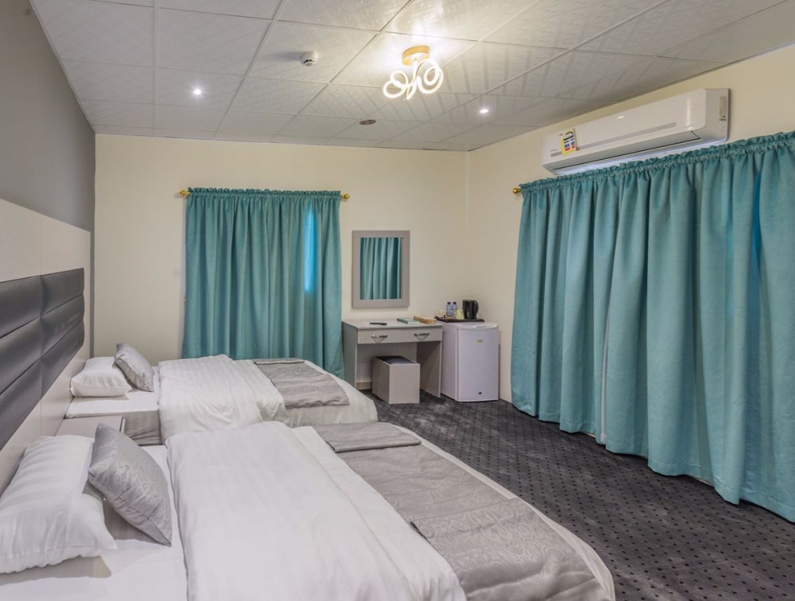 Suite Grand | Cortinas blackout, camas extra, wifi gratis y ropa de cama 