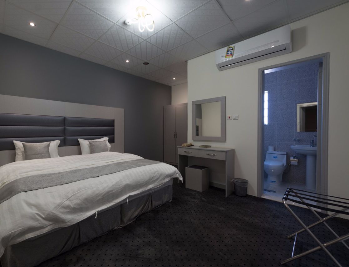 Habitación doble clásica | Baño | Regadera, amenidades de baño gratuitas, toallas 