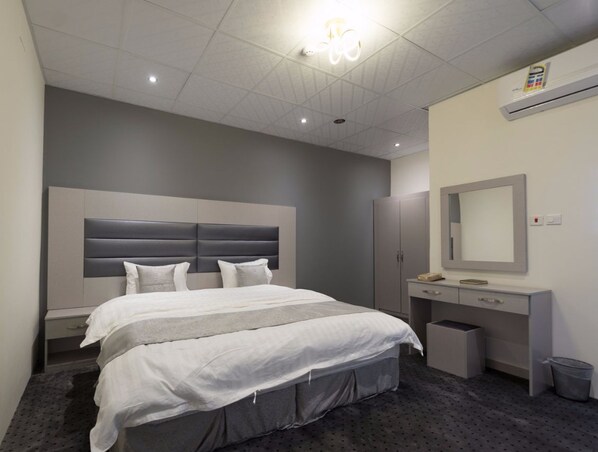 Habitación doble clásica | Cortinas blackout, camas extra, wifi gratis y ropa de cama 