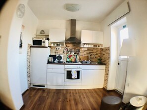 Microwave, dishwasher, coffee/tea maker, cookware/dishes/utensils