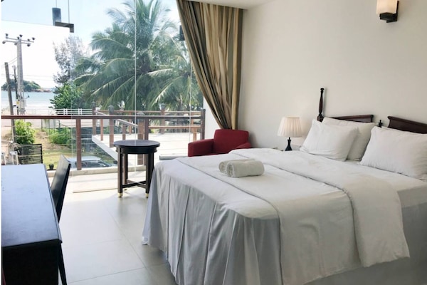 Premium bedding, down duvets, memory-foam beds, in-room safe