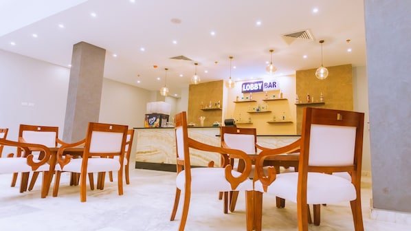 A lobby with wooden chairs, a reception desk, and a bar area labeled "Lobby Bar". - La Rosa Waves Beach - Couple & Families Only (Hurghada)