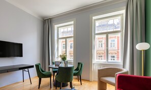 Large 1 Bedroom Apartment with Balcony | Living area | 49-inch flat-screen TV with cable channels, TV, streaming services - Numa Vienna Strauss (Vienna)